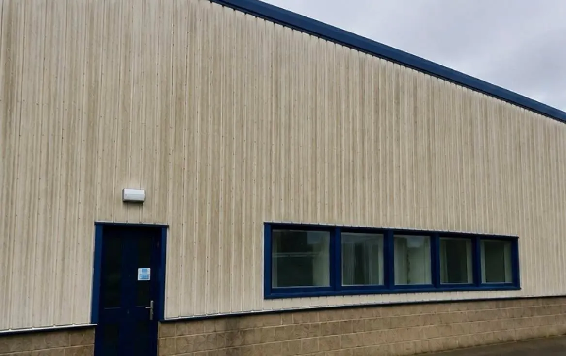 Commercial building before soft washing